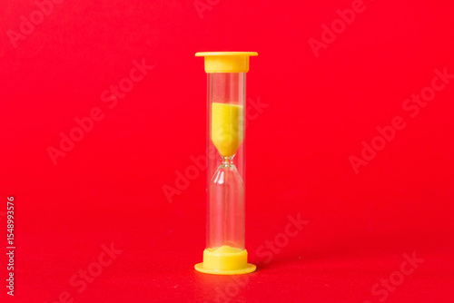 hourglass on the table, sand clock as time passing concept for business deadline, copy space