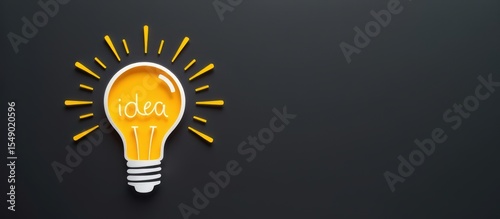 Paper cut art concept. Bright light bulb with the word 
