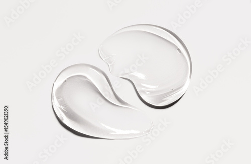 cosmetic sample of transparent gel texture on light background