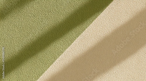 Close up of textured wall with soft shadows showing subtle color variations and surface details in natural lighting