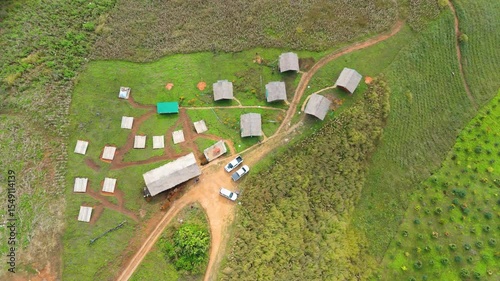 Skyview in the countryside with the village villagers mountain forest waterfall by drone