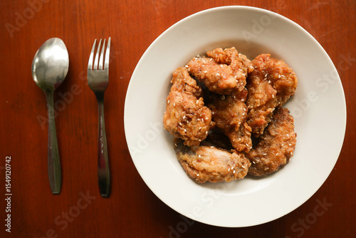 Quadro su tela Delicious homemade crispy fried chicken with spicy taste and lemon on plate