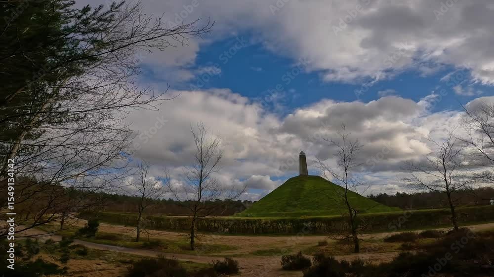 One of the highest points of the Utrecht Hill Ridge, Woudenberg. View of the Pyramide van Austerlitz in Zeist, Netherlands on a cloudy day of spring