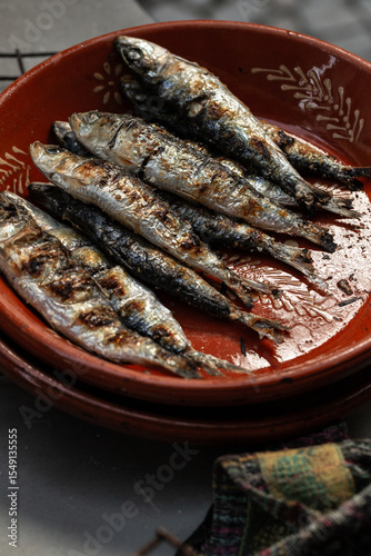 Grilled Sardines are a traditional dish during the Summer Saints Popular Festivals, 