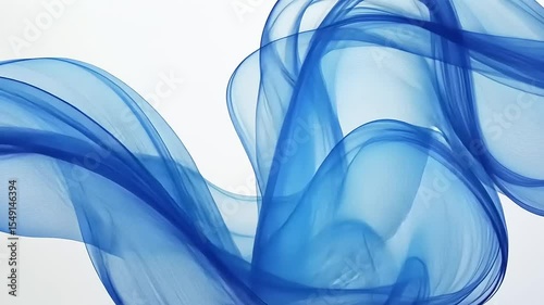 Ethereal blue smoke waves gracefully flowing across a white background, creating a serene atmosphere