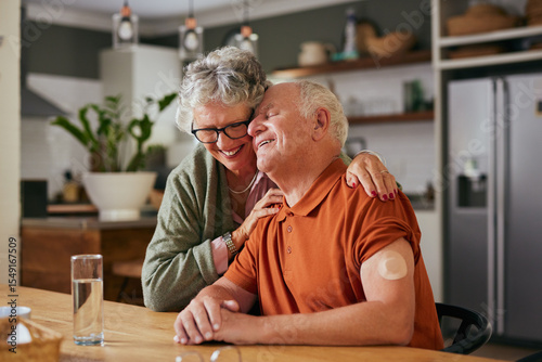 Loving senior couple embracing after measuring blood sugar level