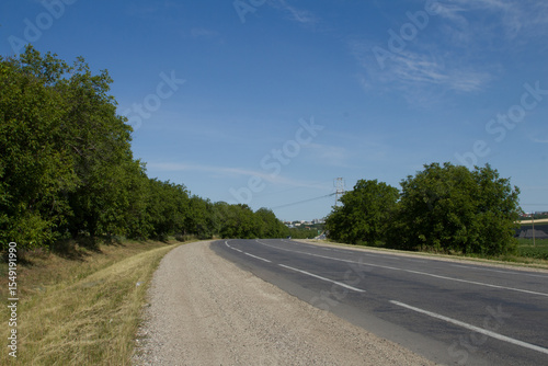 A road with trees on the side