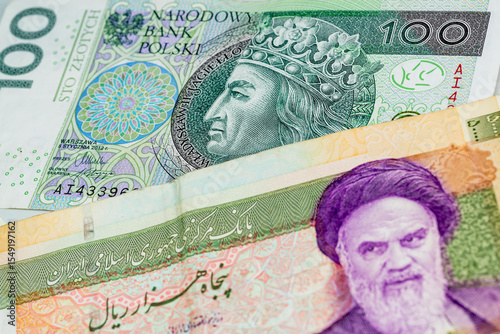 Wallpaper Mural 100 Polish zloty and 50000 Iranian rial banknotes. International trade concept Torontodigital.ca