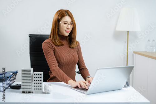 Business woman think of the concept of saving money.