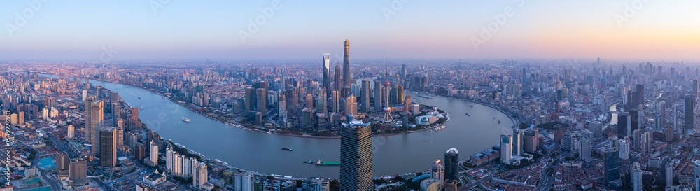 Fototapeta premium Aerial view of Shanghai skyline in downtown at sunset.
