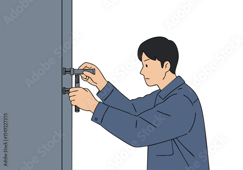 A male professional installs a bolt on a wall. Clear, focused action shot. Simple composition, suitable for commercial use.