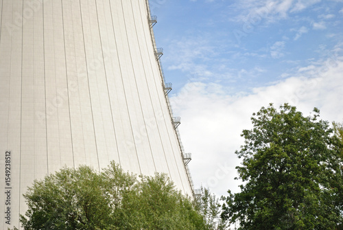 Steel Ladder and Curving Concrete Side of Cooling Tower