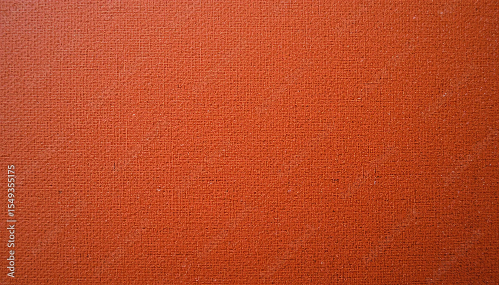 Fototapeta premium Detailed close up of a textured rust orange fabric with natural weave pattern