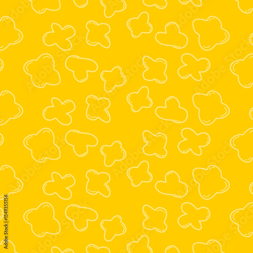 Seamless cartoon popcorn pattern with hand-drawn, irregular shapes in soft yellow tones. Suitable for snack packaging, textile design, or children’s backgrounds.