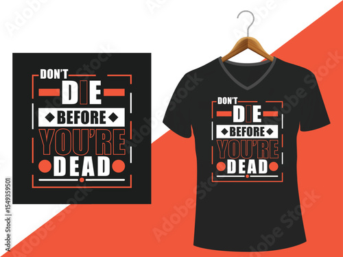 Bold Graphic T-Shirt Design Featuring "Don't Die Before You're Dead" Slogan, Hanging on a Wooden Hanger