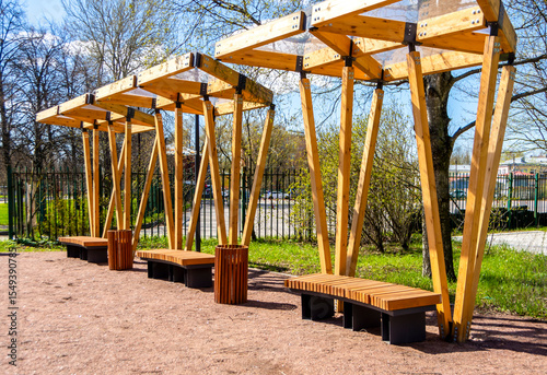 Wallpaper Mural Wooden modern bench in the park. Landscape design Torontodigital.ca