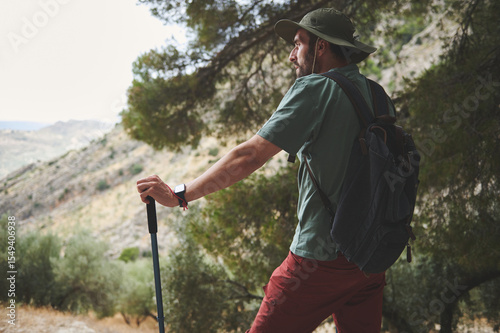 Male Hiker Exploring Nature in Scenic Mountainous Landscape