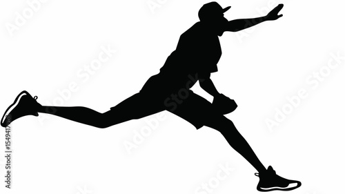 Silhouette of a baseball pitcher in mid throw with arm extended and leg lifted for the pitch