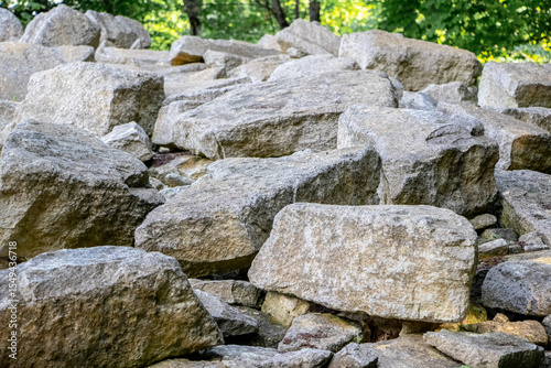 Natural accumulation large unprocessed stones rocks various shapes creating natural stone background ideal design solutions building materials natural landscapes