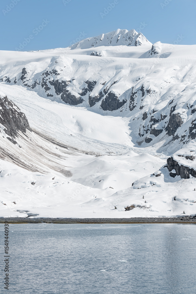 Fototapeta premium Snow Covered Glacier above the Harvard Arm in College Fjord, Alaska, USA
