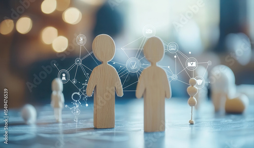 Two wooden figures standing close together, connected by digital network