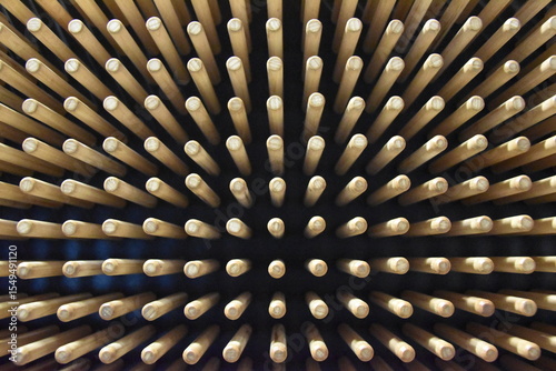 Unique Abstract View of Wooden Sticks Arranged in a rectangular pattern on black background