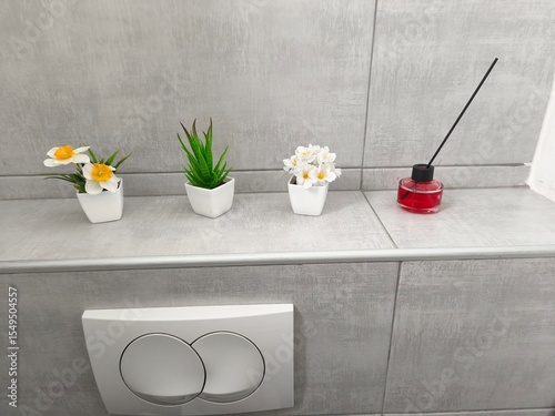 Small fragrant flowers in the toilet