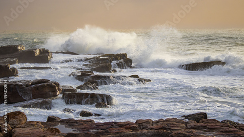Fototapeta Naklejka Na Ścianę i Meble -  waves breaking on the rocks