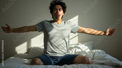 Awakening in Sunlight: An individual stretches, arms outstretched, on a bed. Bathed in natural light, embracing the new day, symbolizing a fresh start. 