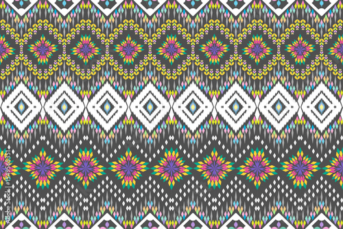Abstract geometric design of ethnic, western fashion for Pakistani, Indian, Arab rugs, fabric, clothing, rugs, vector illustration, embroidery style, seamless, and wallpaper.