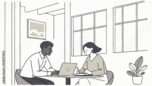 Two people working together at a table with a laptop.
