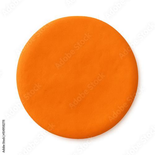 A vibrant orange circle of modeling clay, isolated on white.