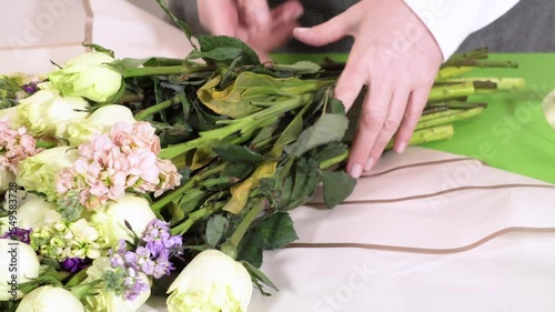 Florist Wrapping Fresh Flower Bouquet