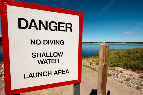 Small boat launch pier on the Rainbow Flowage, Wisconsin River,  near Lake Tomahawk, Wisconsin. Sign states 