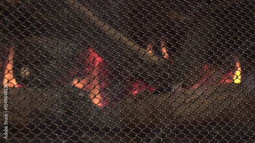 Living room fireplace with focus on metal protecting guard 4k
