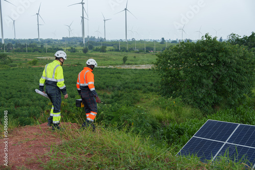 Solar energy engineers work on consulting and monitoring the efficiency of wind turbines.