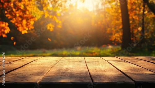 Autumnal wooden table in park