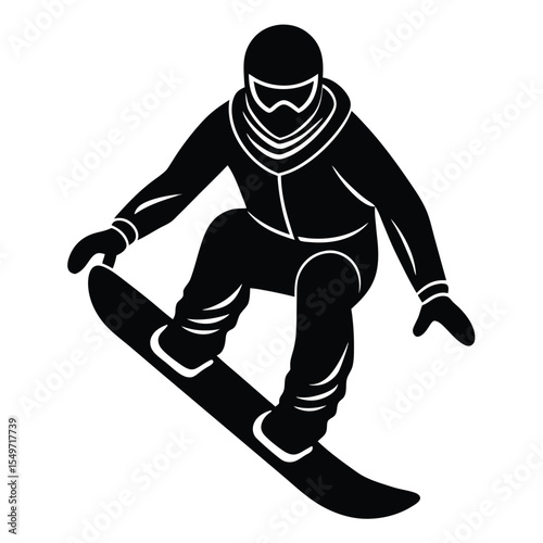 Silhouette of a snowboarder in action wearing goggles and winter clothing