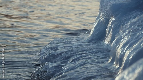 Wallpaper Mural The mesmerizing beauty of ocean waves and their foam dances gracefully at sunset Torontodigital.ca