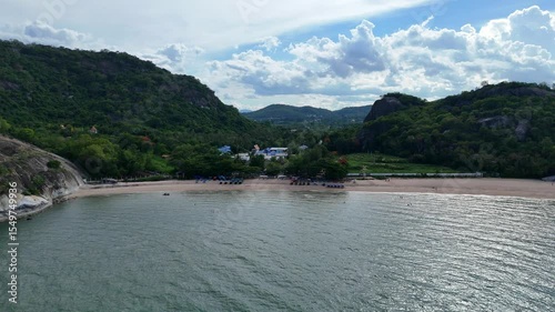 Secluded coastline with green hills and open sea