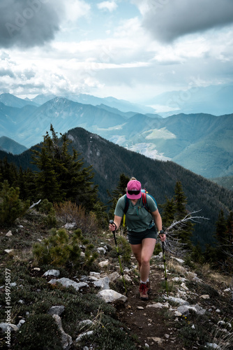 woman hiker high up in the mountains