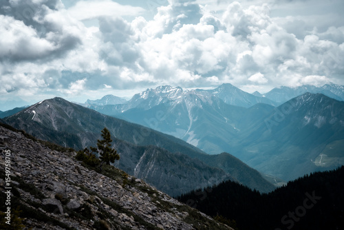 mountain scape with cloudy skies above