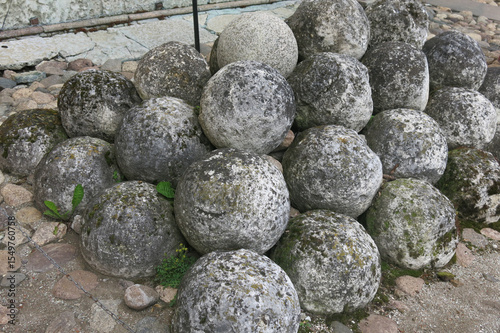 Fototapet limestone cannon balls for medieval cannon
