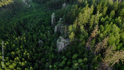 Drone footage of cliffs in the Czech forests at sunset