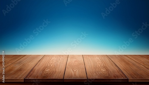 empty brown wooden table top over blue gradient background