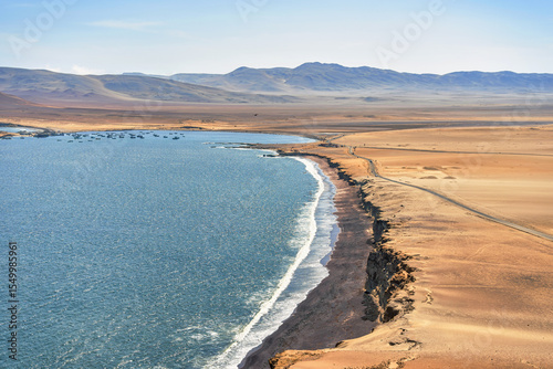 Wallpaper Mural A breathtaking view of Playa Roja, known for its unique red sand and the dramatic cliffs in Paracas Natural Reserve. Torontodigital.ca