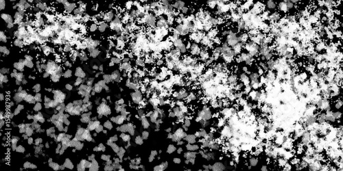 Snowflakes on dark background. white icy snowflakes isolated on black background, natural background. white crystalline powder on a black background. sugar dust. texture, pattern and clipping.