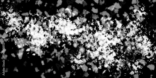 Snowflakes on dark background. white icy snowflakes isolated on black background, natural background. white crystalline powder on a black background. sugar dust. texture, pattern and clipping.