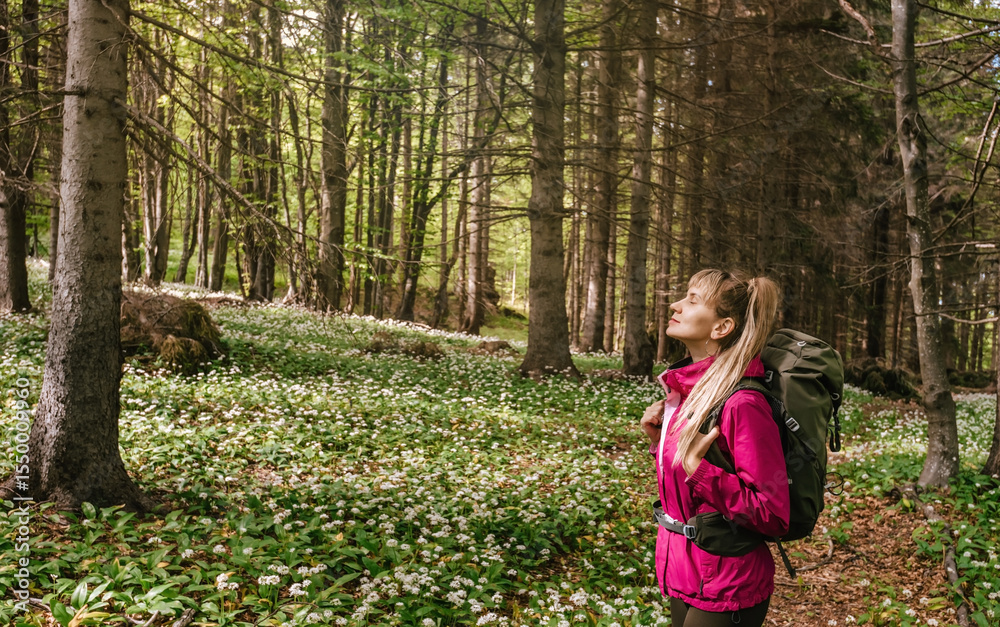 Woman Breathing Fresh Air in Forest Glade Woman Breathing Fresh Air in Forest Glade