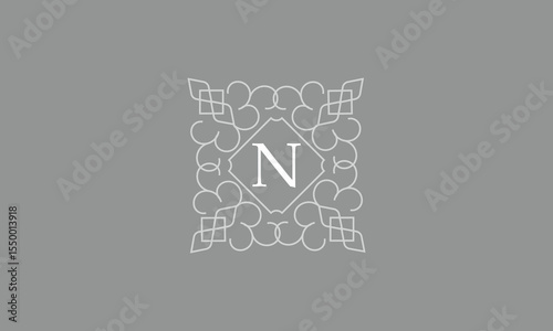 Elegant logo template for restaurant, boutique, cafe, hotel jewelry, fashion with initial N. Vector floral monogram.